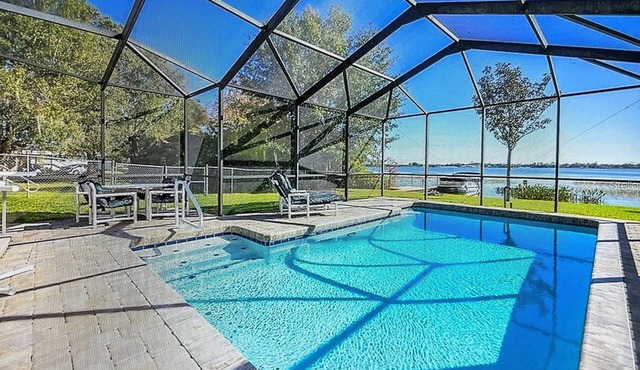 Lake Shipp House with pool and dock on the water