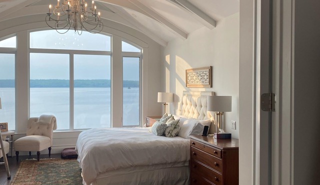 Lake side Chateau and Coach House with private beach and Hot Tubs.