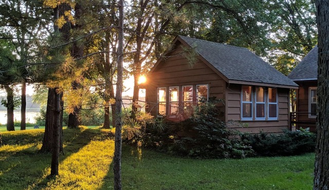 Lake Stella beautiful beach and spacious deck on quiet private drive.