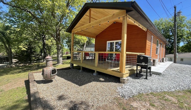 Lake view 2 bedroom cabin that sleeps 6. Private deck and fire pit area.