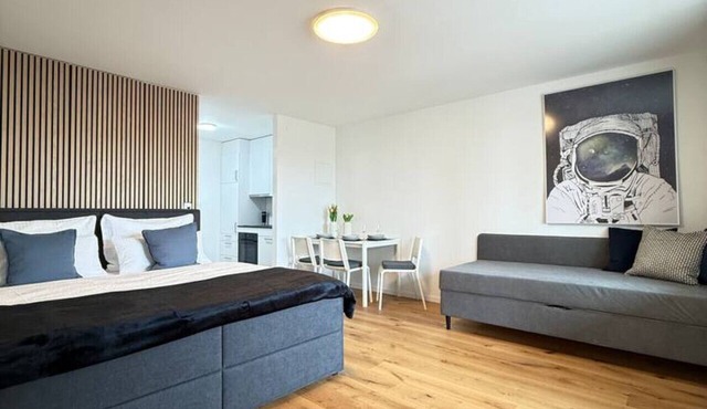 Lake view apartment with balcony