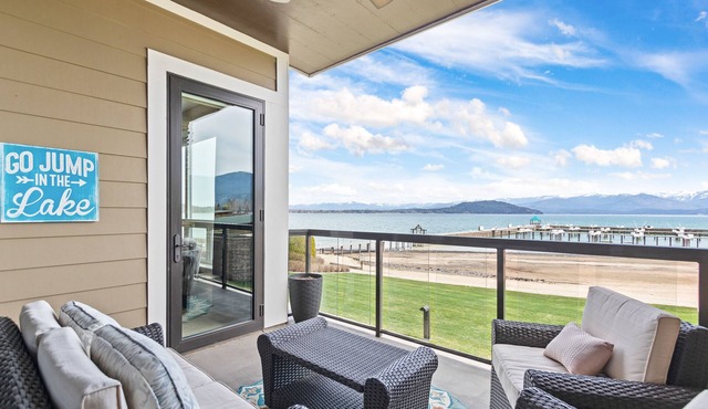 Lake view condo with WiFi, balcony, fireplace, & shared pool/hot tub/grills