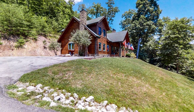 Lake view dog-friendly cabin w/private deck, gas grill, wood fireplace, and W/D