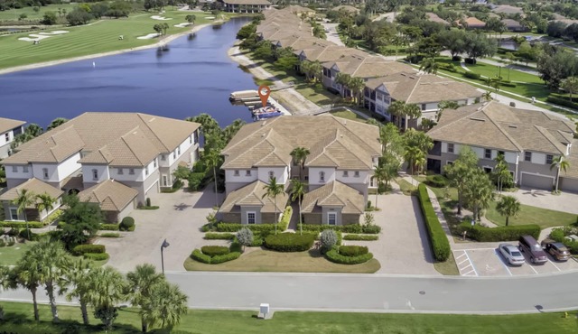 Lake View First Floor Coach Home At Amenities Filled - The Quarry of Naples