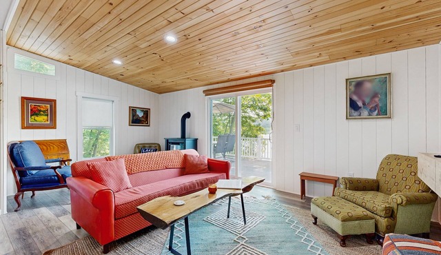 Lake-view home with private water access, dock, 2 kayaks, deck, & fireplaces