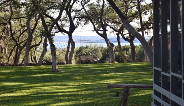 Lake View house with park like yard with cowboy pool to beat the heat !