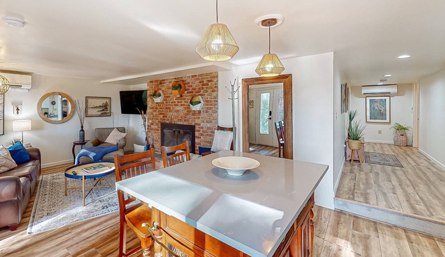 Lake view suite with beautiful setting, fireplace, firepit & tree-lined patio