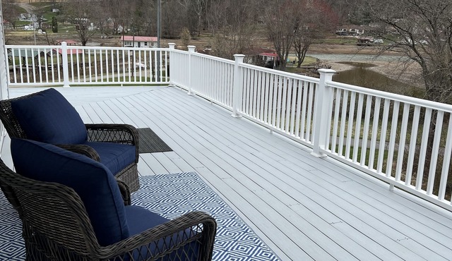 Lake Whitetail Cottage 3/2 with a carport & large back porch.