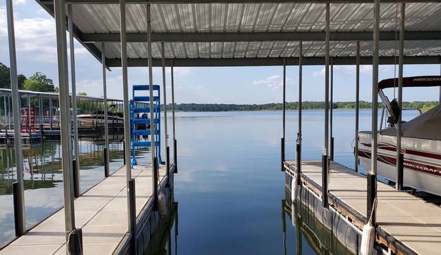 Lake Woods Retreat with 28' dock slip located on Pomme de Terre Lake!