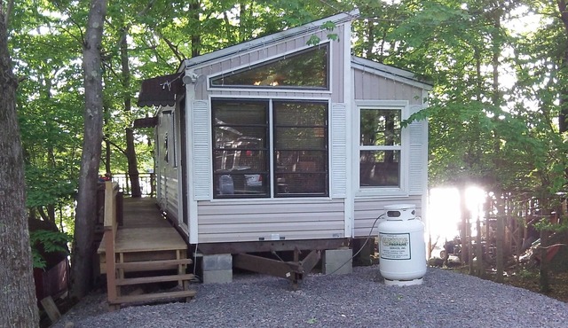 Lakefront 1BR cabin with boat and private dock, beaches, and fishing