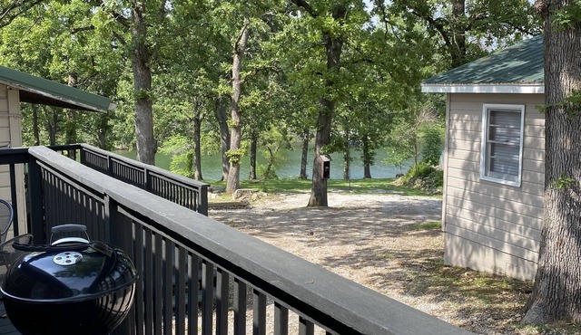 Lakefront 2BR Cabin w/Pool + Swim & Boat dock