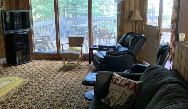 Lakefront cabin at Candle Lake with boat slip