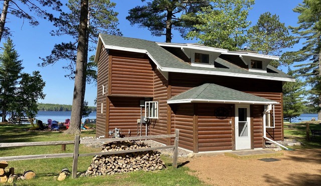 Lakefront cabin on Lost Lake with dock and firepit next to bar and grill!