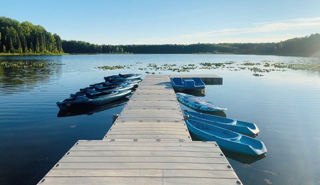 lakefront cabin with boats, sauna, hot tub, fire pits, trails, fishing gear