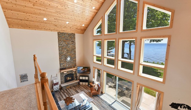 Lakefront cabin with wall of windows and game room!