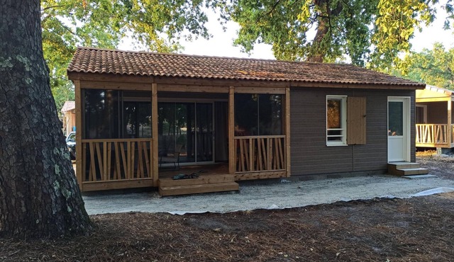 Lakefront chalet with pool, air conditioning, and parking