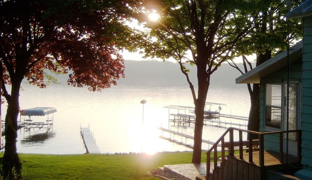 Lakefront cottage on first basin of Lake James. Dock, sandy bottom, great sunset