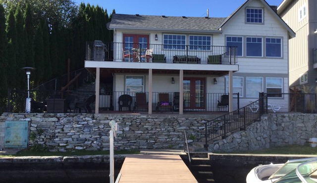 Lakefront Cottage on South Shore with private dock + boat lift + buoy.