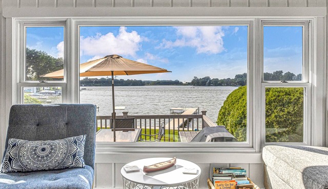 Lakefront Cottage with kayaks, paddleboat, aqua mat, & BIG deck close to Elkhart