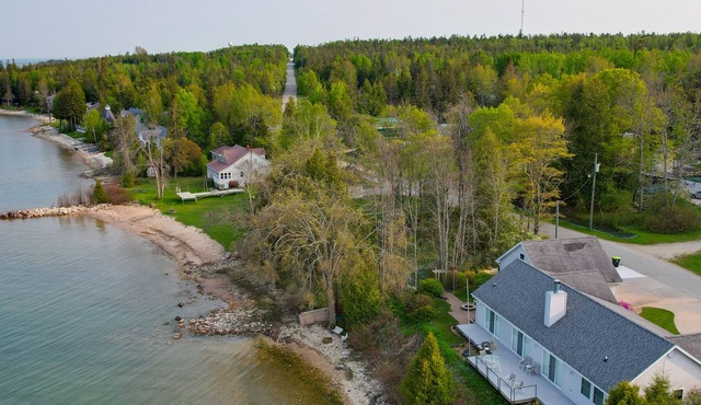 Lakefront De Tour Village Home w/Deck & Fire Pit!