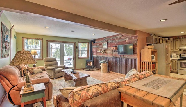 Lakefront Deer River Apt with Dock, Fire Pit and Patio