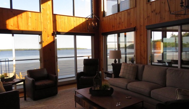 Lakefront Getaway just steps to the water, with games, docks, kayaks, and more!