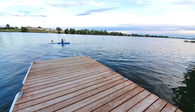 Lakefront Getaway. Private Waterfront Home with Dock and Sunroom.