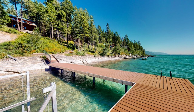 Lakefront getaway with dock, 400- square-foot deck, close to town