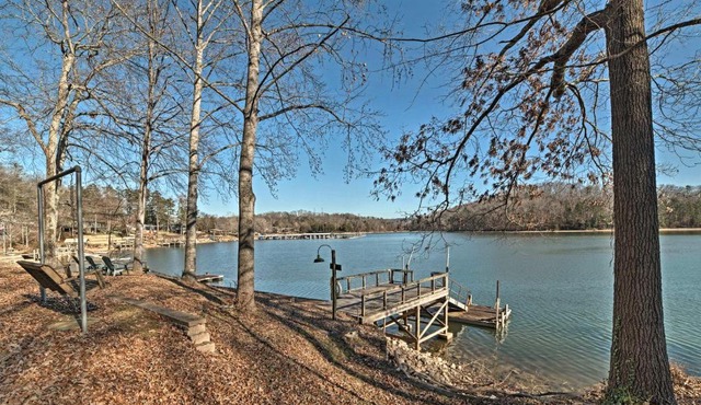 Lakefront Harrison Home with Sunroom, Deck, and Dock!
