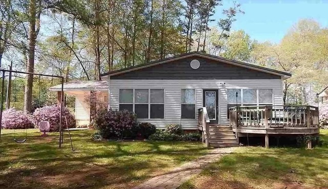 Lakefront home- 3 slip boathouse-Large yard