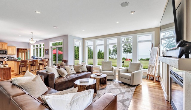 Lakefront Home Offering Sweeping Views of Lake Michigan with Beach Access