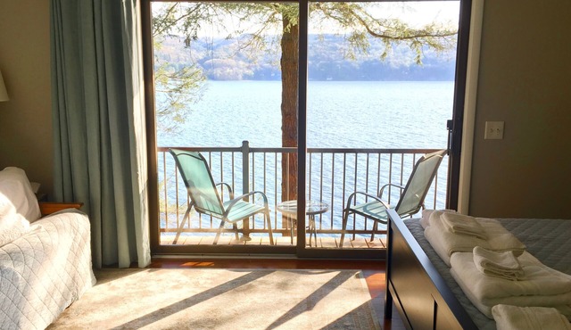 Lakefront home on 380' of secluded forested frontage,Lake Pines-Skaneateles Lake