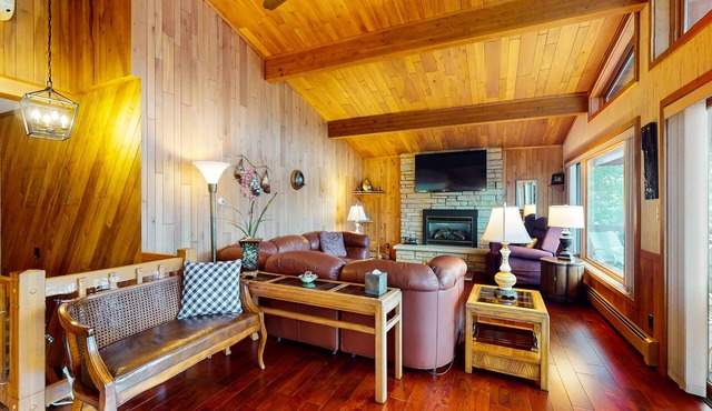 Lakefront home on South Two Lakes with lake views, lake access, firepit, & dock