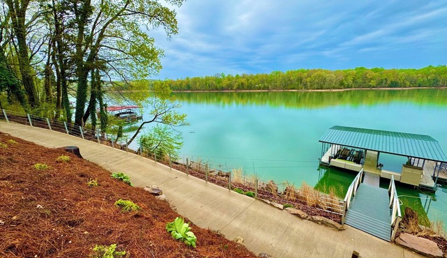 Lakefront Home with Dock & INDOOR Pool & KING BEDS! Great parking options!