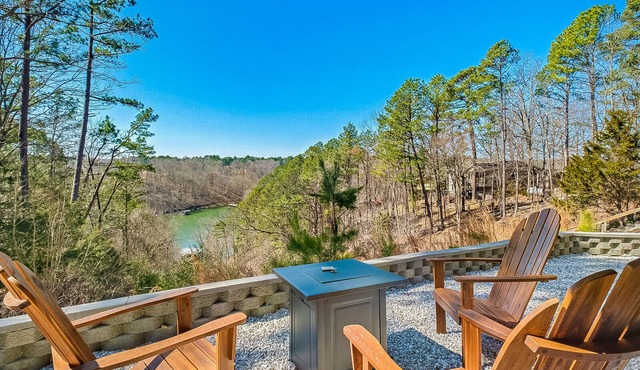 Lakefront home with a game room, washer/dryer, central AC & firepit