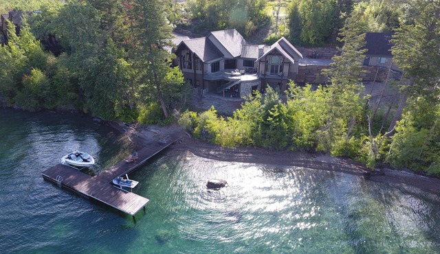 Lakefront home with boat dock & private hot tub!