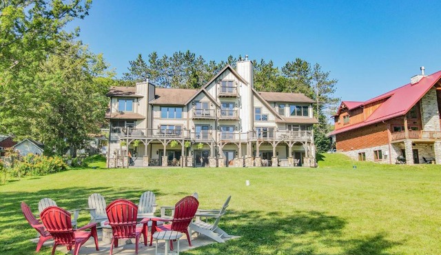 Lakefront home with fire pit and dock Near Wisp Resort