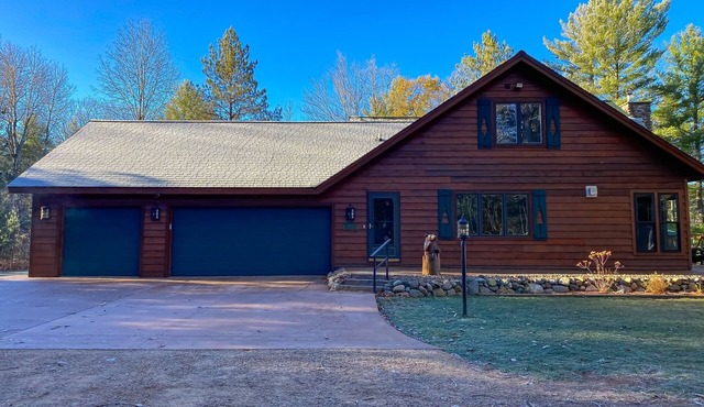Lakefront home with game rooms, dock, kayaks, private beach, fireplace, firepit