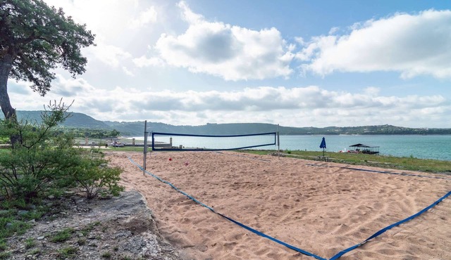 Lakefront Home with Lake Views, Boat Dock, Sand Volleyball and Optional Bar and Game Room