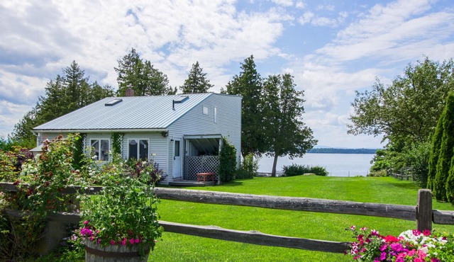 Lakefront Home with Patio Over the Lake, Private Dock, & Stunning Sunset Views