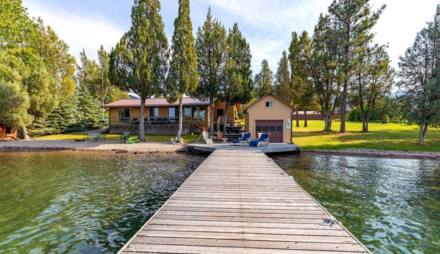 Lakefront home with private beach, dock, firepit, & grill - dazzling sunset view