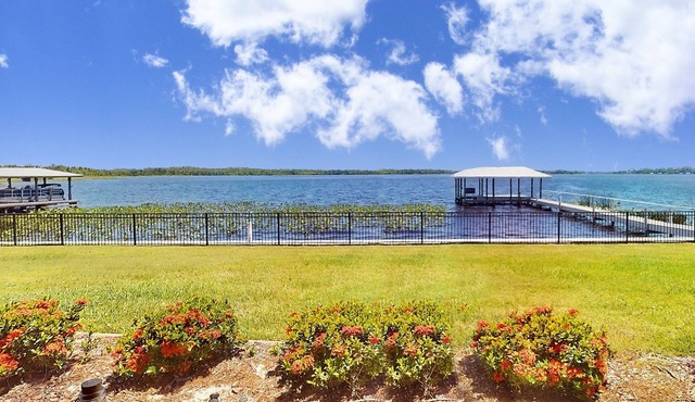 Lakefront home with private dock, garage parking, sunroom,W/D and WIFI