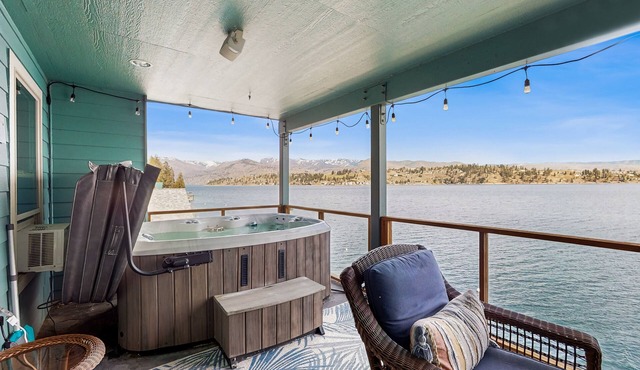 Lakefront home with private hot tub, dock, kayaks, covered veranda & huge views