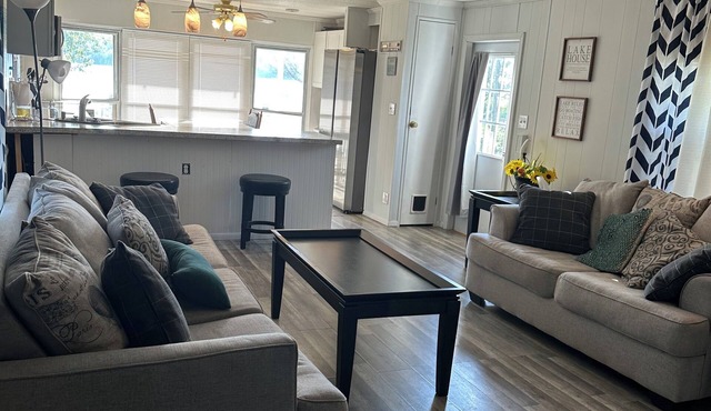 Lakefront home with private swim dock on Grand Lake Pet friendly & fenced yard.