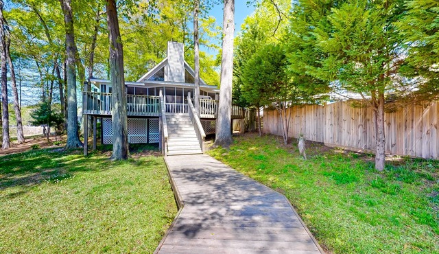 Lakefront home with two boat slips, lake views, firepit, grill, deck, & 2 kayaks