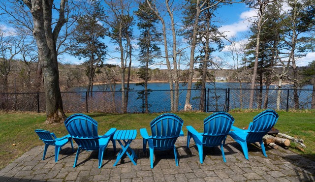 Lakefront Home with Porch, Patio and Fenced Yard - Short Drive to Beach