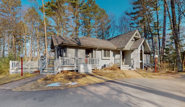 Lakefront home with private outdoor sauna, dock, firepit, wood fireplace & patio