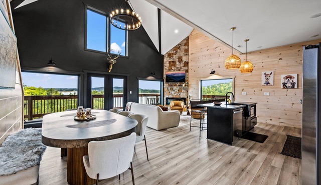 Lakefront home with retro accents, private pool, and private dock.