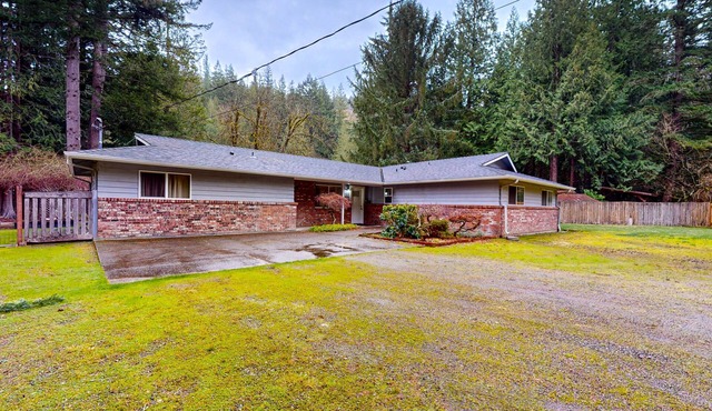 Lakefront home with private dock, lake views, firepit, & wood stove