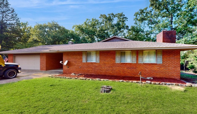 Lakefront home with water view, central AC, & washer/dryer